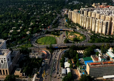 A Hyperlapse aerial shot of the flyover with running traffic in New Delhi, India