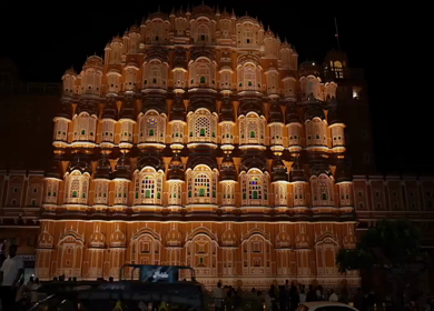 A Night view of Hawa Mahal illuminated at night in Jaipur, India