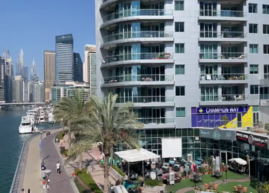30 March 2023 : A Pan Shot of Jumeirah Beach Residence - JBR and Dubai Tram moving at Dubai,UAE