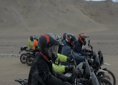 A Shot of Adventure Bikers Group in Cold Desert Landscape of Ladakh India