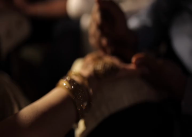 A Slow Motion Shot of Applying Mehndi on Bride's hand at her Indian Wedding in India