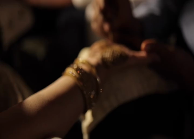 A Slow Motion Shot of Applying Mehndi on Bride's hand at her Indian Wedding in India