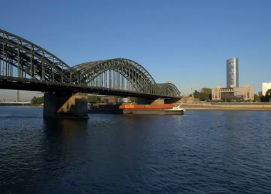 A Shot of Cargo Ship Passing Under Hohenzollern Bridge in Cologne German