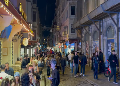 4th June 2026 : A Shot of Crowded Night Street Leading to Galata Tower in Istanbul Turkey