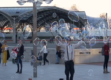 20th March 2026 : A Shot of Street Performer Creating Soap Bubbles Near Train Station in Germany