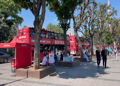 4th June 2026 : A Shot of Tourists and Busforus Sightseeing Buses in Istanbul Turkey