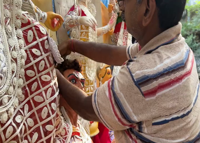 28th September 2025 : A Shot of Workers Decorating Durga Puja Pandal with Idols in India