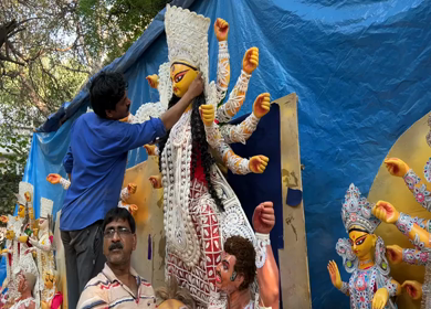 28th September 2025 : A Shot of Workers Decorating Durga Puja Pandal with Idols in India