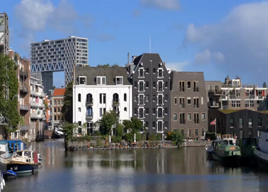 A Slow Motion Shot of Boat and Bridge from boat in Canal Amsterdam