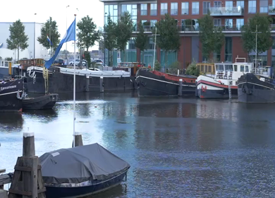 20th March 2026 : A Slow Motion Shot of Boat and Bridge from boat in Canal Amsterdam