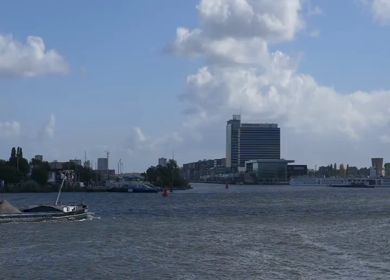 20th March 2026 : A Slow Motion Shot of Boat and Bridge from boat in Canal Amsterdam