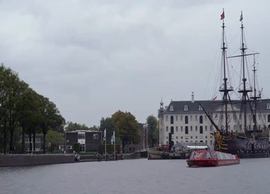 20th March 2026 : A Slow Motion Shot of Boat and Bridge from boat in Canal Amsterdam
