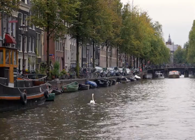 20th March 2026 : A Slow Motion Shot of Boat and Bridge from boat in Canal Amsterdam