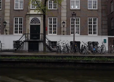 20th March 2026 : A Slow Motion Shot of Boat and Bridge from boat in Canal Amsterdam