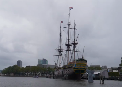 A Slow Motion Shot of Boat and Bridge from boat in Canal Amsterdam