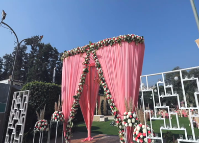 A slow motion Shot of the venue of an Indian Wedding being decorated in India