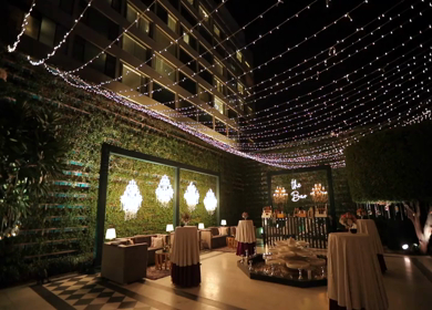 A slow motion shot of a bar being setup at an Indian wedding in New Delhi, India