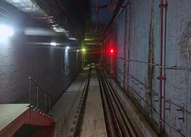A Timelapse Shot of Delhi Metro Train Moving from Tunnel to Elevated Track at Sunset Delhi India