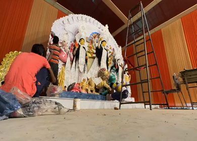 28th September 2025 : A Timelapse Shot of Workers Decorating Durga Puja Pandal with Idols in India