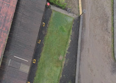 Aerial Drone View of Bhandardara Landscape with Green Valley River and Monsoon Clouds Maharashtra India