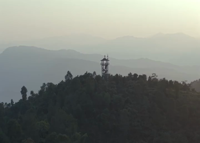 Aerial Drone View of Hilltop Watchtower at Sunrise in Nagaland, Northeast India
