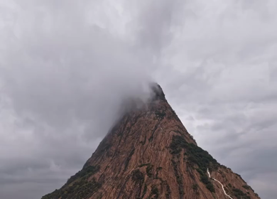 Aerial Hyperlapse of Kondarangi Hills Peak in Misty Clouds, Tamil Nadu India