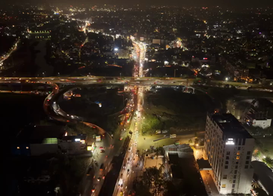Aerial Night Hyperlapse View of Maduravoyal Flyover Interchange and City Traffic Chennai Tamil Nadu