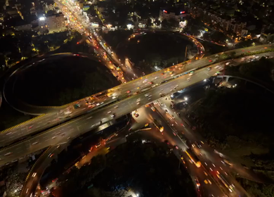 Aerial Night Hyperlapse View of Maduravoyal Flyover Interchange and City Traffic Chennai Tamil Nadu