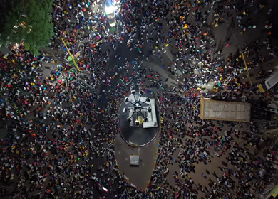 Aerial Night View of Azhagar Festival Crowd Near Vaigai River in Madurai Tamil Nadu India