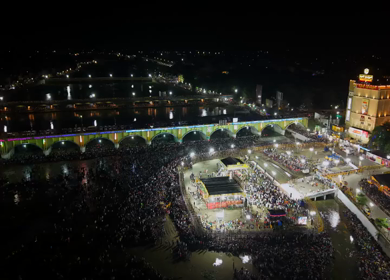 Aerial Night View of Azhagar Festival Crowd Near Vaigai River in Madurai Tamil Nadu India