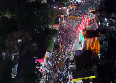Aerial Night View of Azhagar Festival Crowd Near Vaigai River in Madurai Tamil Nadu India
