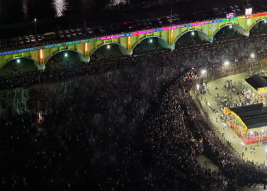 Aerial Night View of Azhagar Festival Crowd Near Vaigai River in Madurai Tamil Nadu India
