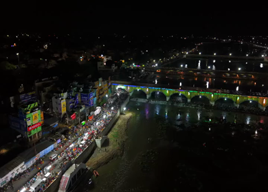 12th May 2025 : Aerial Night View of Azhagar Festival Crowd Near Vaigai River in Madurai Tamil Nadu India