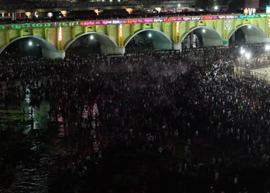 12th May 2025 : Aerial Night View of Azhagar Festival Crowd Near Vaigai River in Madurai Tamil Nadu India