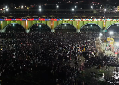 12th May 2025 : Aerial Night View of Azhagar Festival Crowd Near Vaigai River in Madurai Tamil Nadu India