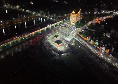 Aerial Night View of Azhagar Festival Crowd Near Vaigai River in Madurai Tamil Nadu India