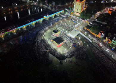 Aerial Night View of Azhagar Festival Crowd Near Vaigai River in Madurai Tamil Nadu India