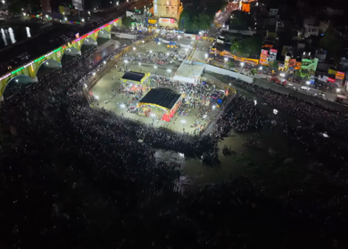 Aerial Night View of Azhagar Festival Crowd Near Vaigai River in Madurai Tamil Nadu India