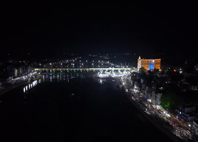 Aerial Night View of Azhagar Festival Crowd Near Vaigai River in Madurai Tamil Nadu India