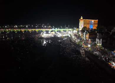 Aerial Night View of Azhagar Festival Crowd Near Vaigai River in Madurai Tamil Nadu India