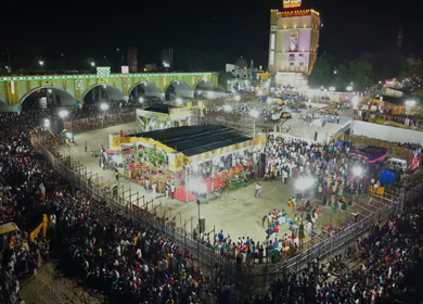 Aerial Night View of Azhagar Festival Crowd Near Vaigai River in Madurai Tamil Nadu India