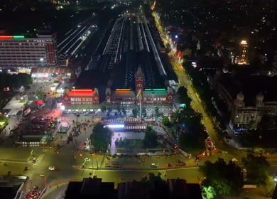 Aerial Night View of Chennai Central Railway Station and City Traffic