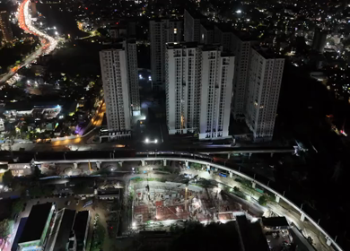 Aerial Night View of Chennai Metro Train and Cityscape Chennai India