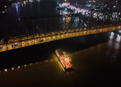 Aerial Night View of Howrah Bridge and Ferry River Kolkata, India