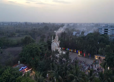 Aerial Night View of Lord Shiva Statue and Devotees in Jabalpur, India