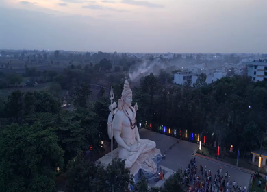 Aerial Night View of Lord Shiva Statue and Devotees in Jabalpur, India