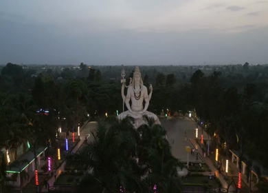 Aerial Night View of Lord Shiva Statue and Devotees in Jabalpur, India