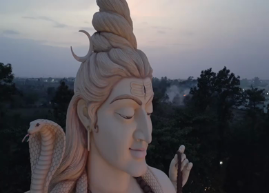 Aerial Night View of Lord Shiva Statue and Devotees in Jabalpur, India