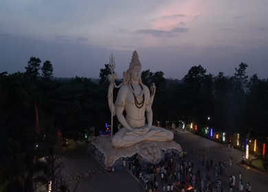 Aerial Night View of Lord Shiva Statue and Devotees in Jabalpur, India