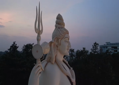 Aerial Night View of Lord Shiva Statue and Devotees in Jabalpur, India